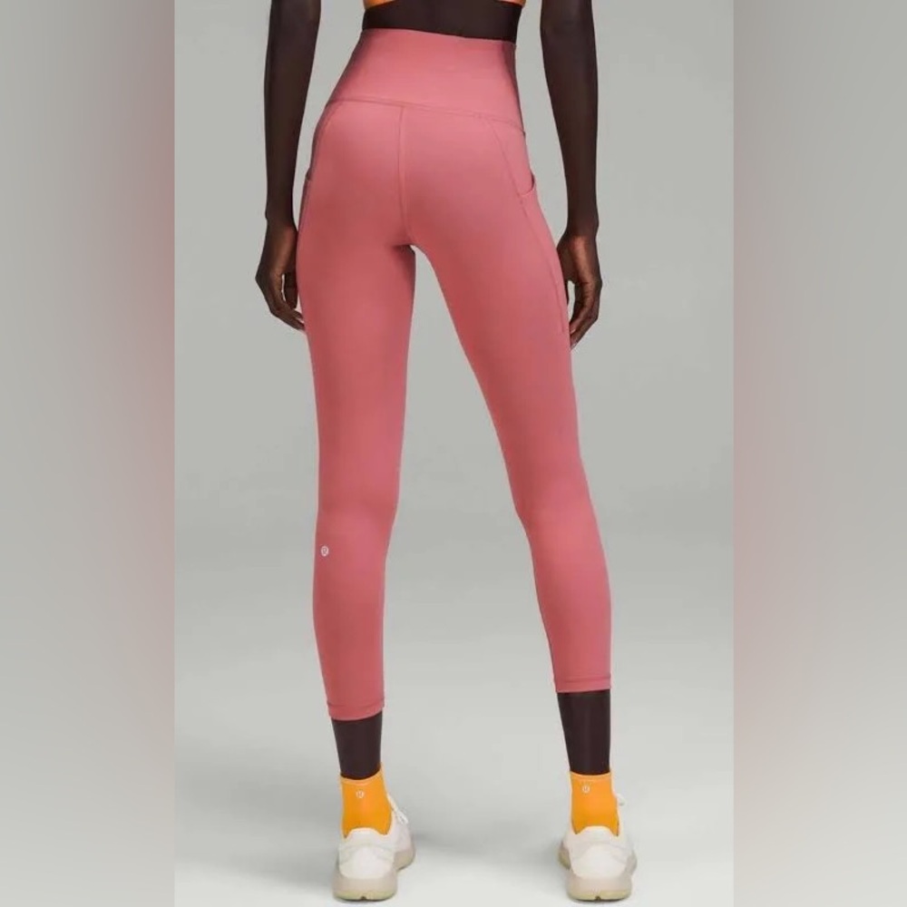 Lululemon high-rise wunder train tight with pockets, size 4, 25”, brier rose